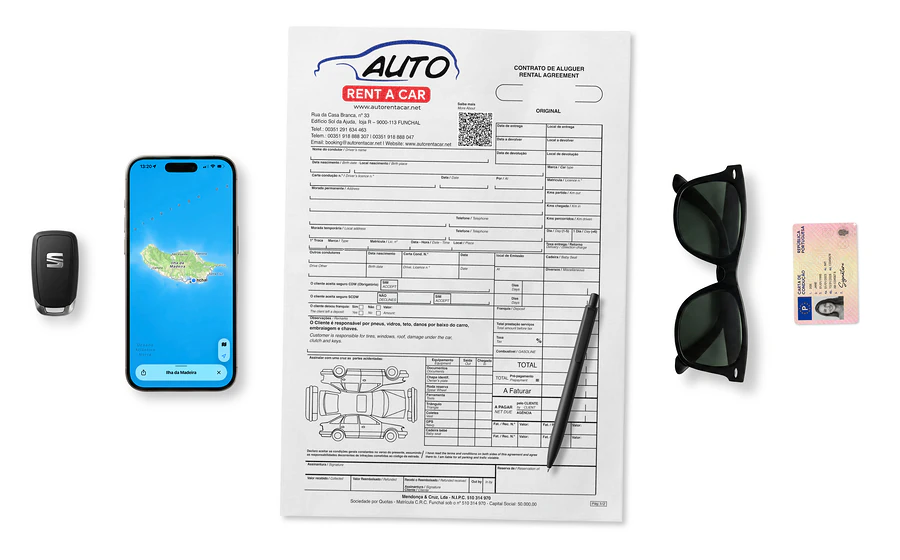 Vacation essentials including phone, car keys, rental document, and sunglasses